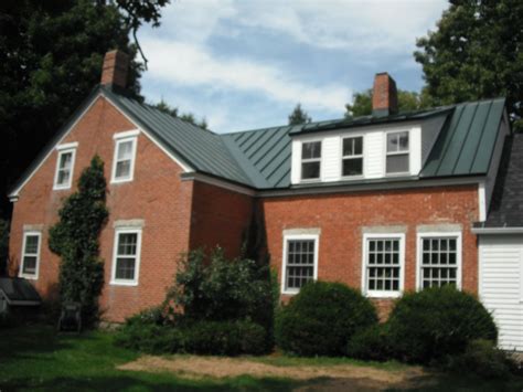 red brick house metal roof|brick homes with metal roofs.